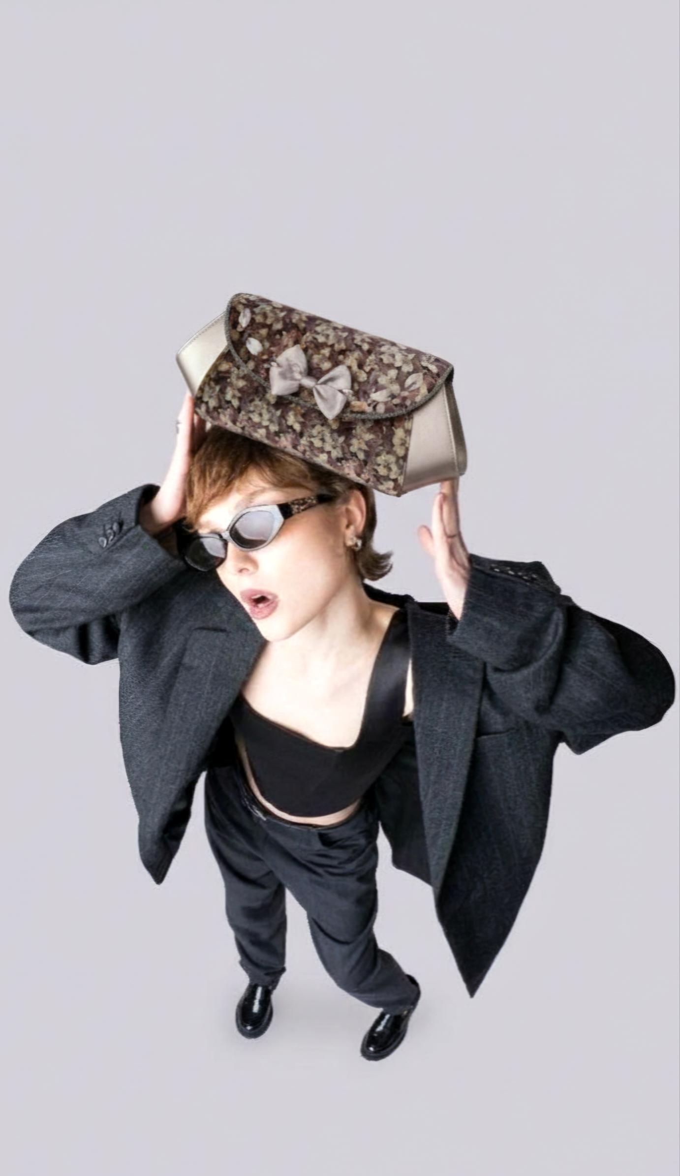 default_8bd16e28-6cf7-471c-94a8-ce92525d5642_2 BOLSO PALMA PLATA. - Imagen 1